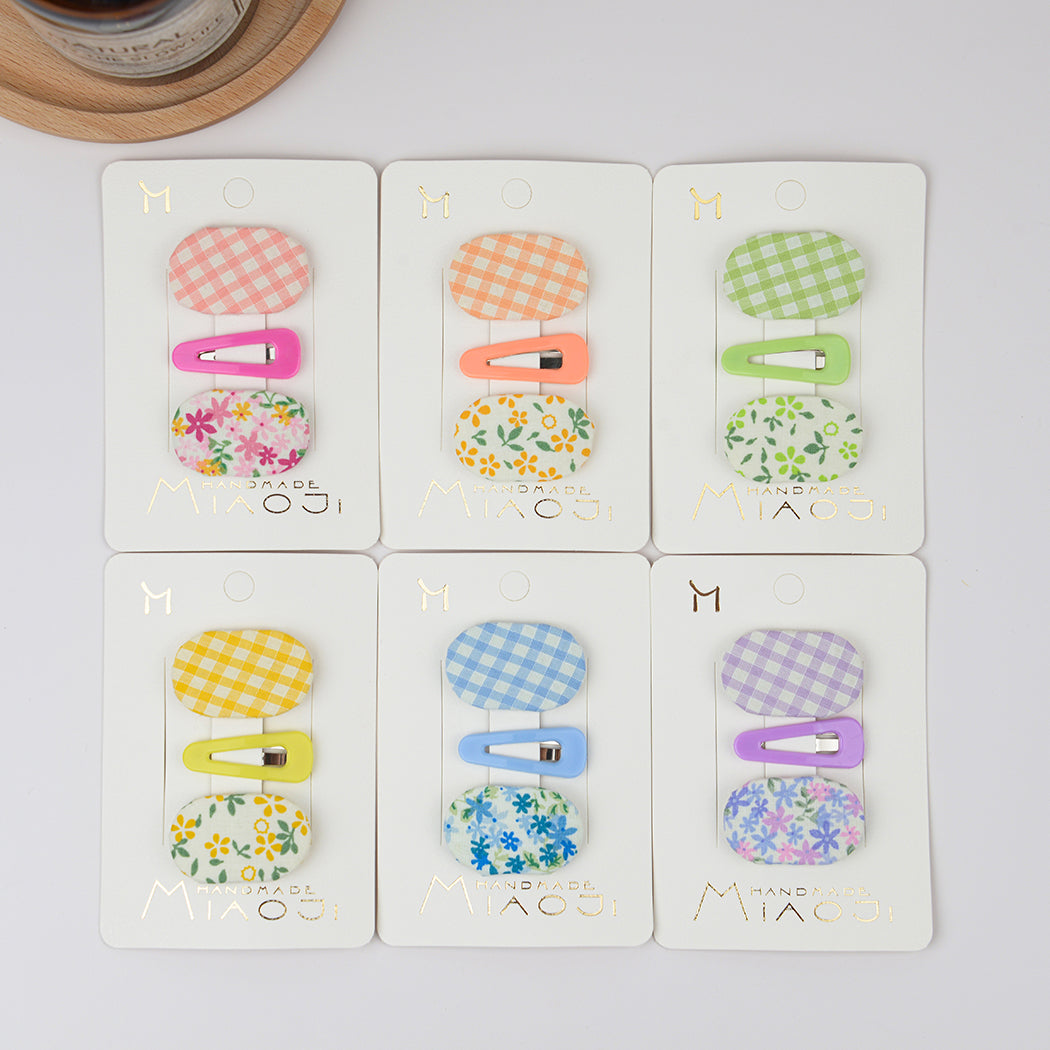 Clip BB de tela floral a cuadros