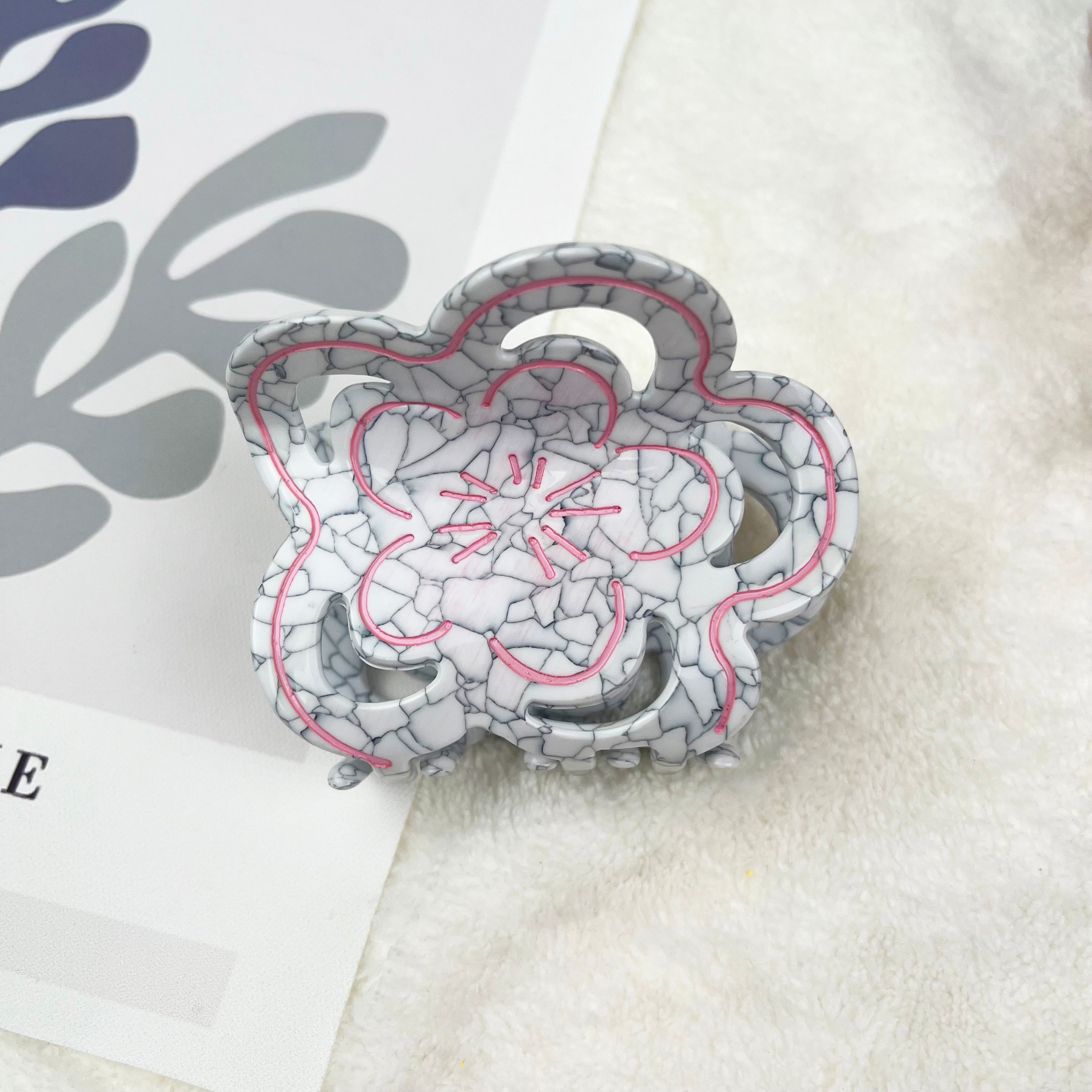 Broken porcelain hollow flower hair claw clip